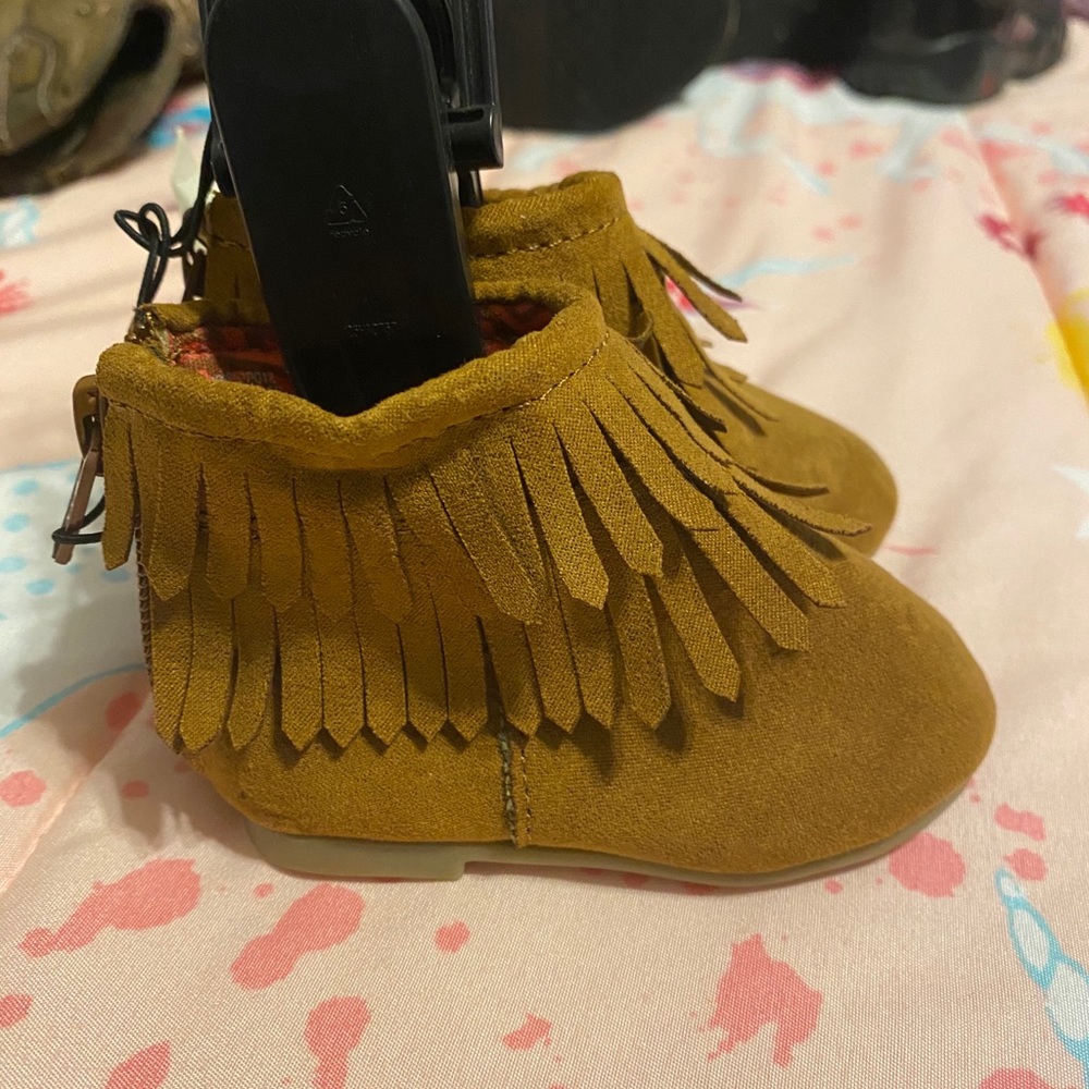 Brand new, with tags. Never worn